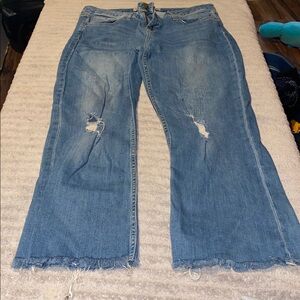 Distressed Blue Jeans with Frayed Hem and their capris